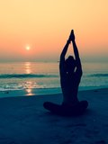 5-silhouette-of-woman-doing-yoga-on-a-beach.jpg